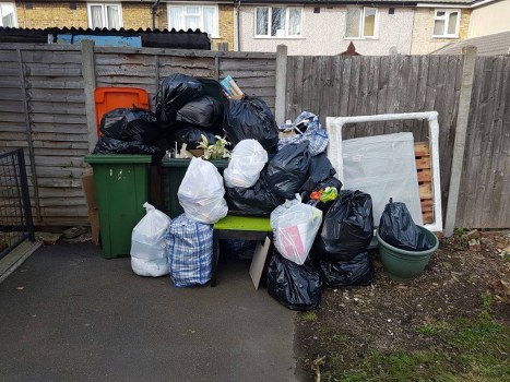 Construction site with waste disposal containers in Brent Cross