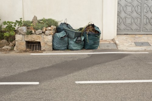 Professional skip collection at a building site in Brent Cross