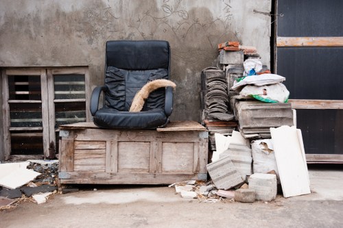 Home renovation waste being loaded into a skip
